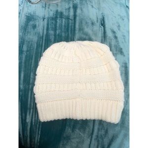 C.C. Beanie with ponytail/bun hole. Never worn.